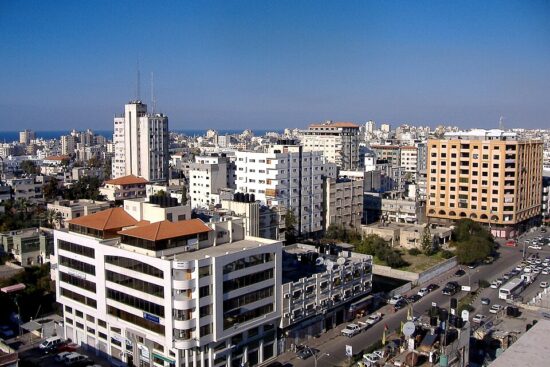 Buildings and streets in Gaza City with the Mediterranean Sea in the distance, photographed in 2007.