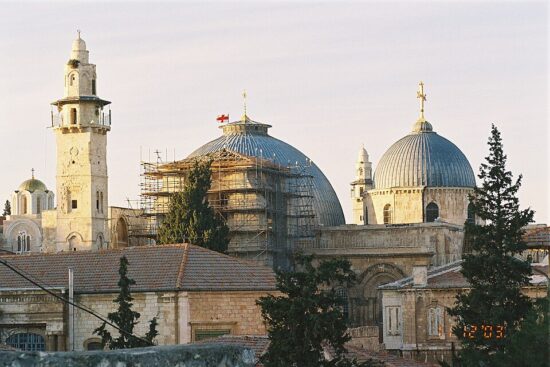 Domes of the Church of the Holy Sepulchre above the rooftops of Jerusalem’s Old City.